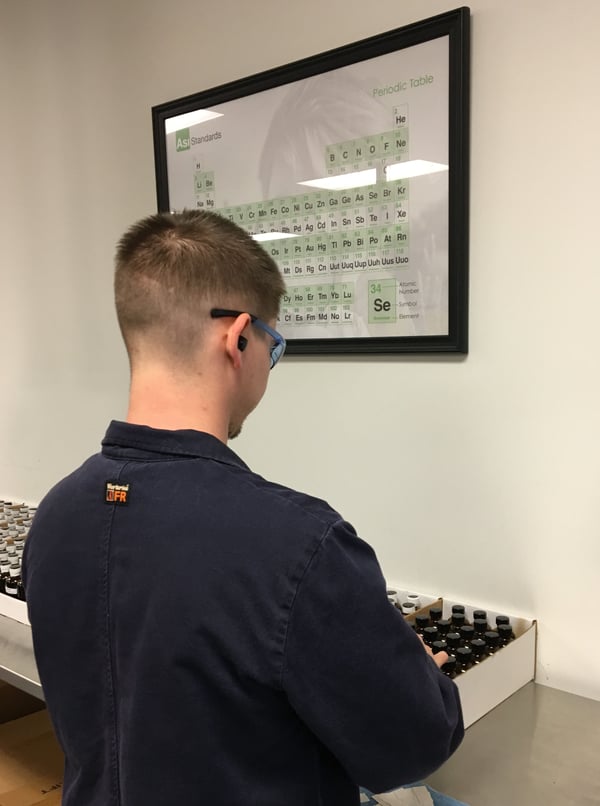 Production Technician Justin finishes bottling the latest lot of SMO10